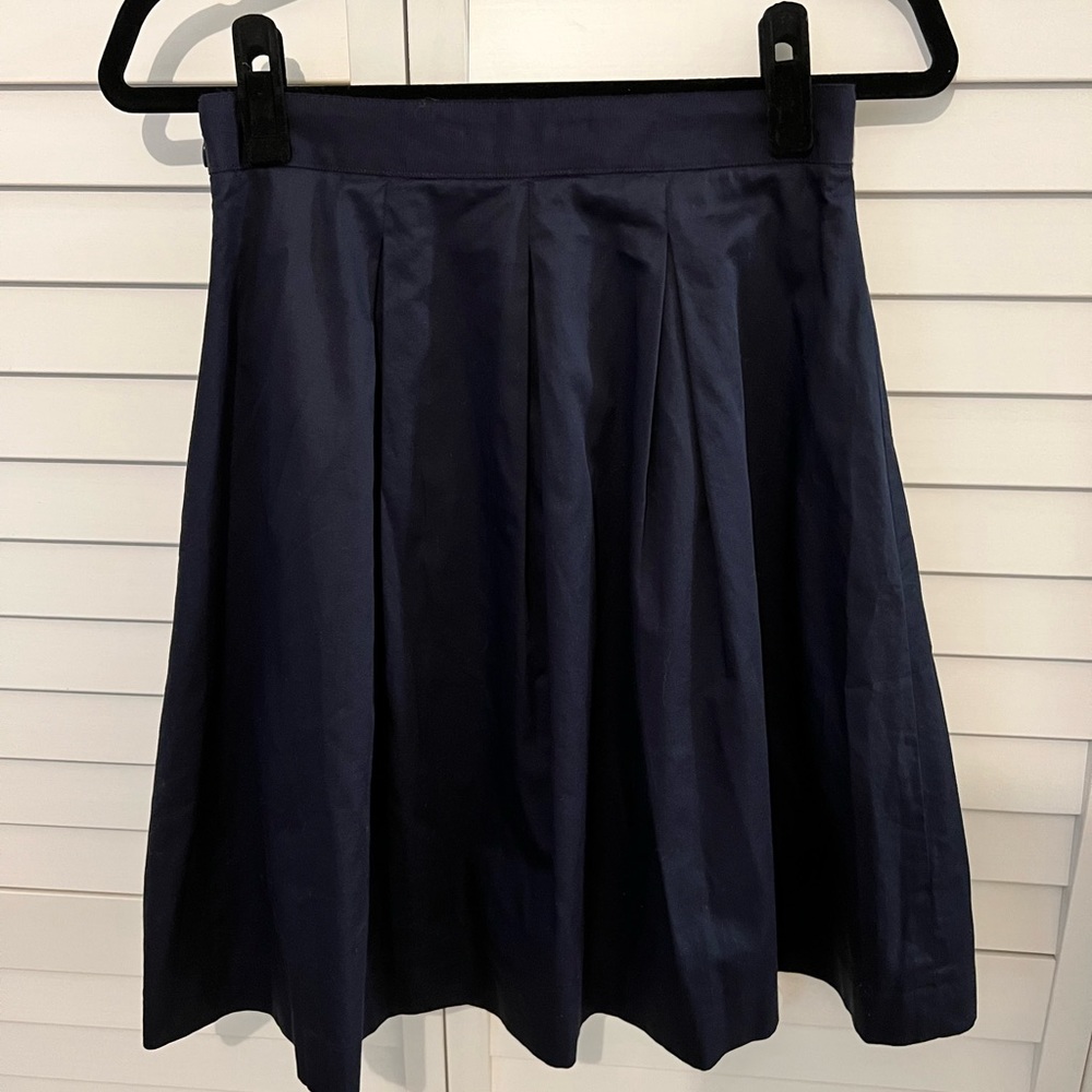 Navy pleated A-line skirt